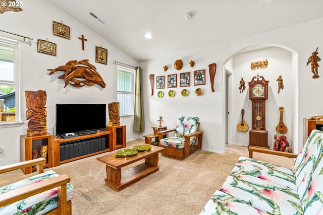 5739 Donohoe Ave, Eugene, OR 97402 - carpeted living area with vaulted ceiling, arched walkways, and recessed lighting