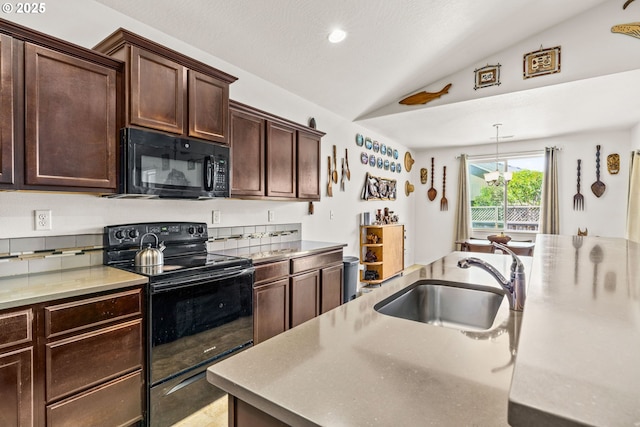 5739 Donohoe Ave, Eugene, OR 97402 - kitchen with black appliances, vaulted ceiling, dark brown cabinetry, light countertops, and recessed lighting