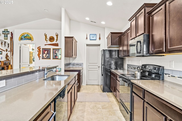 5739 Donohoe Ave, Eugene, OR 97402 - kitchen featuring black appliances, lofted ceiling, dark brown cabinets, recessed lighting, and light countertops