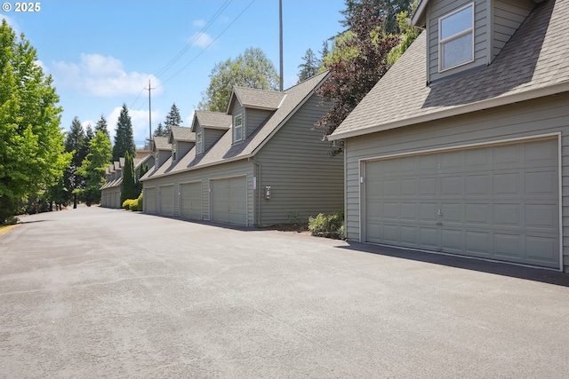 14569 NW Larson Rd Unit 13, Portland, OR 97231 - view of property exterior featuring a shingled roof