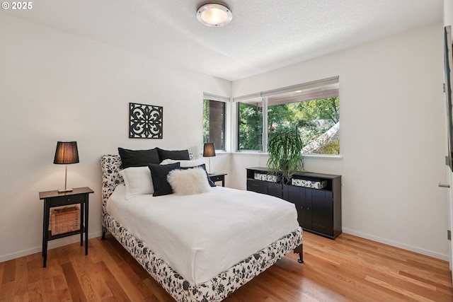 14569 NW Larson Rd Unit 13, Portland, OR 97231 - bedroom featuring light wood-type flooring