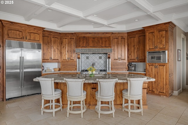 2650 Lorinda Ln, West Linn, OR 97068 - kitchen featuring stainless steel built in refrigerator, coffered ceiling, tasteful backsplash, beam ceiling, and light stone counters