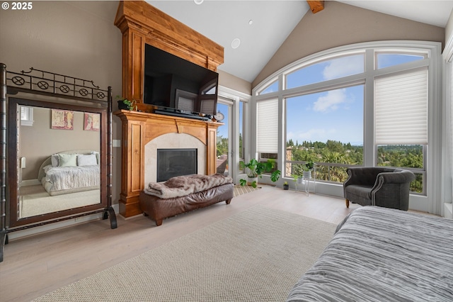2650 Lorinda Ln, West Linn, OR 97068 - bedroom featuring wood finished floors, a high end fireplace, high vaulted ceiling, and beamed ceiling