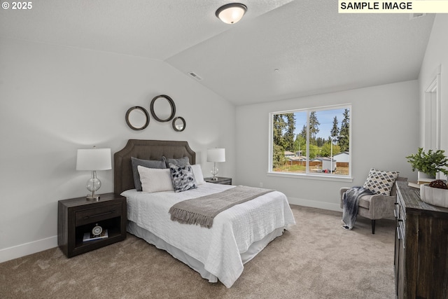 carpeted bedroom featuring a textured ceiling, visible vents, vaulted ceiling, and baseboards