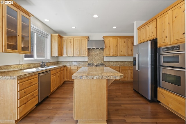 3504 NE Garfield St, Camas, WA 98607 - kitchen with appliances with stainless steel finishes, extractor fan, tile counters, a kitchen island, and light brown cabinets
