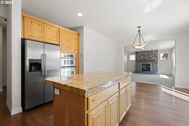 3504 NE Garfield St, Camas, WA 98607 - kitchen featuring stainless steel appliances, tile countertops, light brown cabinetry, a kitchen island, and recessed lighting