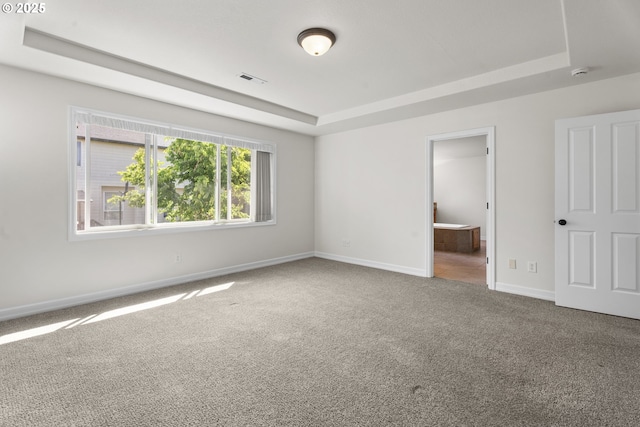 3504 NE Garfield St, Camas, WA 98607 - unfurnished bedroom featuring a tray ceiling, carpet, and connected bathroom