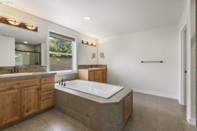 3504 NE Garfield St, Camas, WA 98607 - bathroom with vanity, a shower stall, tile patterned flooring, and a garden tub