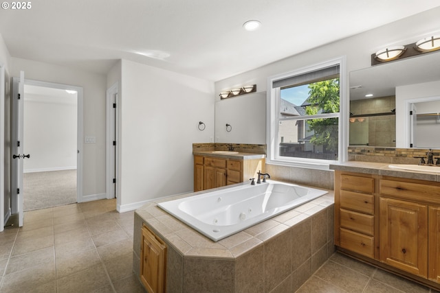 3504 NE Garfield St, Camas, WA 98607 - bathroom featuring vanity, a whirlpool tub, a shower stall, and tile patterned flooring