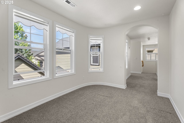 3504 NE Garfield St, Camas, WA 98607 - carpeted empty room with arched walkways and recessed lighting
