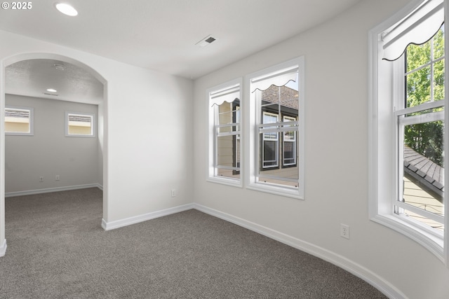 3504 NE Garfield St, Camas, WA 98607 - carpeted spare room with healthy amount of natural light, arched walkways, and recessed lighting