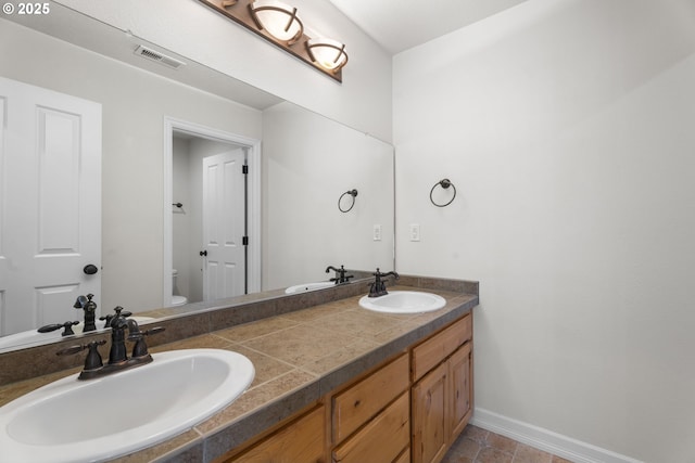 3504 NE Garfield St, Camas, WA 98607 - bathroom with baseboards and double vanity