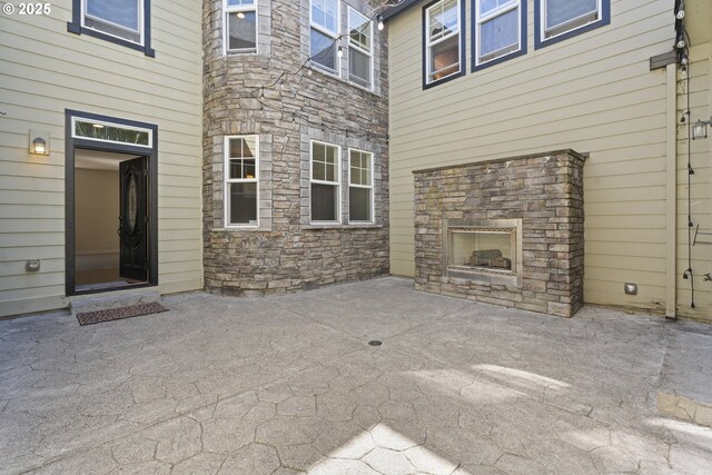 3504 NE Garfield St, Camas, WA 98607 - view of patio featuring exterior fireplace