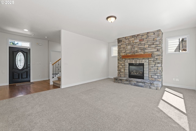 3504 NE Garfield St, Camas, WA 98607 - unfurnished living room featuring carpet, stairway, and a fireplace