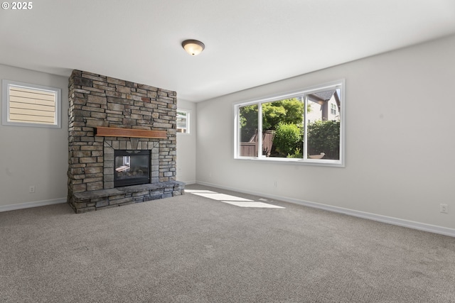 3504 NE Garfield St, Camas, WA 98607 - unfurnished living room with a stone fireplace and carpet