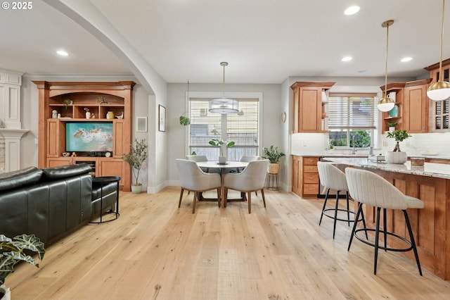 915 NE 36th Ave, Camas, WA 98607 - kitchen with open shelves, tasteful backsplash, light wood-type flooring, and recessed lighting