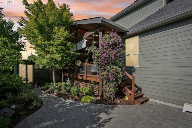 915 NE 36th Ave, Camas, WA 98607 - view of home's exterior with a deck, roof with shingles, and a patio area