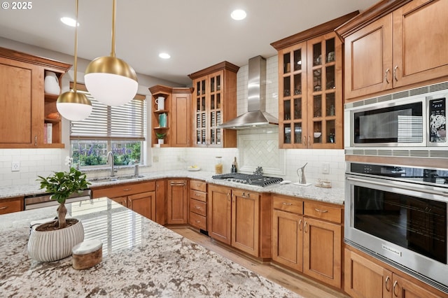 915 NE 36th Ave, Camas, WA 98607 - kitchen with appliances with stainless steel finishes, wall chimney range hood, open shelves, tasteful backsplash, and recessed lighting