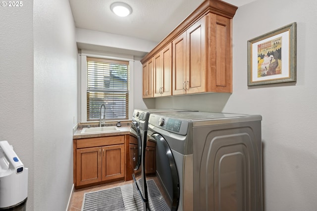 915 NE 36th Ave, Camas, WA 98607 - washroom featuring cabinet space, separate washer and dryer, and light tile patterned floors