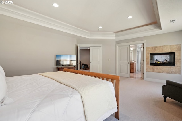 915 NE 36th Ave, Camas, WA 98607 - bedroom featuring a raised ceiling, carpet, recessed lighting, a tiled fireplace, and ensuite bathroom