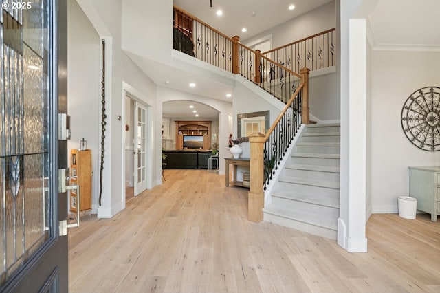 915 NE 36th Ave, Camas, WA 98607 - foyer entrance with wood finished floors, stairs, recessed lighting, arched walkways, and a towering ceiling
