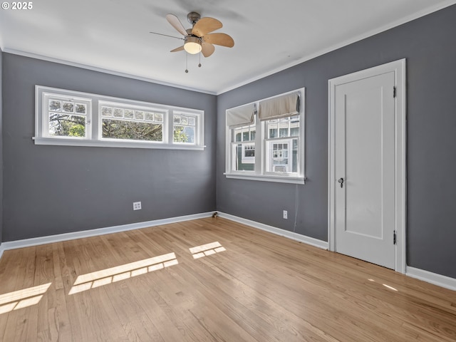 3310 NE 70th Ave, Portland, OR 97213 - empty room with a ceiling fan, wood finished floors, baseboards, and ornamental molding