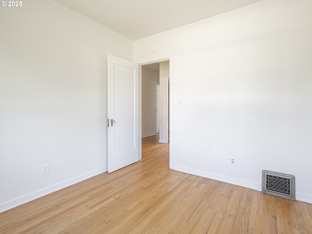 3310 NE 70th Ave, Portland, OR 97213 - unfurnished room with crown molding, light wood-style flooring, and baseboards