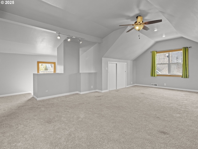 3310 NE 70th Ave, Portland, OR 97213 - additional living space featuring lofted ceiling, carpet floors, a ceiling fan, and baseboards