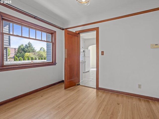 3310 NE 70th Ave, Portland, OR 97213 - unfurnished room with baseboards and light wood-type flooring