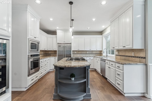 kitchen with built in appliances, open shelves, dark wood-type flooring, and white cabinetry