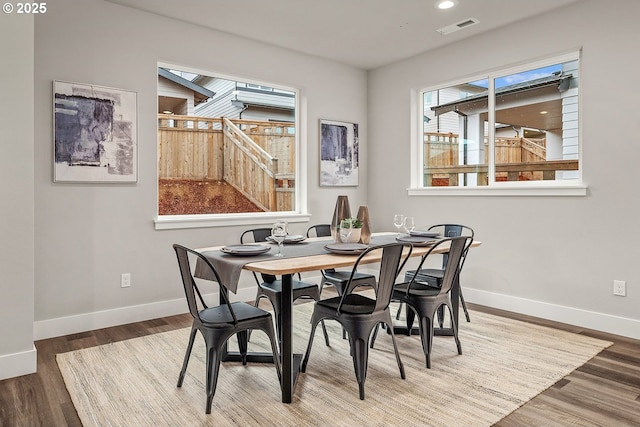16779 SE Shimmering Leaf St, Happy Valley, OR 97086 - dining room with baseboards, recessed lighting, wood finished floors, and visible vents