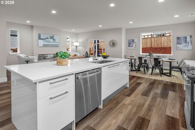 16779 SE Shimmering Leaf St, Happy Valley, OR 97086 - kitchen with open floor plan, modern cabinets, white cabinets, a sink, and stainless steel appliances