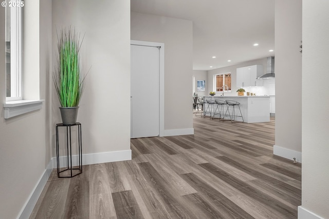 16779 SE Shimmering Leaf St, Happy Valley, OR 97086 - interior space featuring light wood-type flooring, recessed lighting, and baseboards