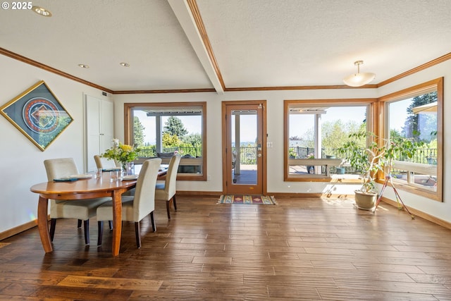 dining space with crown molding, a textured ceiling, baseboards, and wood-type flooring