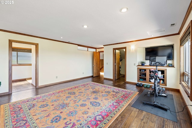 bedroom featuring visible vents, crown molding, baseboards, wood-type flooring, and recessed lighting