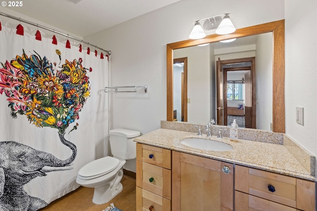 full bathroom with vanity, toilet, and a shower with curtain