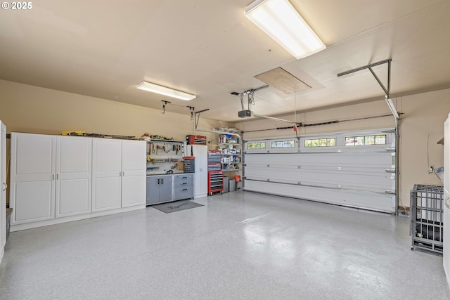 garage featuring a garage door opener
