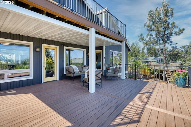 wooden deck with an outdoor hangout area