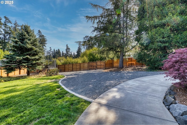 view of yard with fence