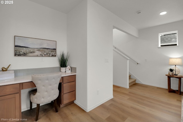 1033 Sommerville Loop, Harrisburg, OR 97446 - home office with light wood-style floors, built in study area, recessed lighting, and baseboards