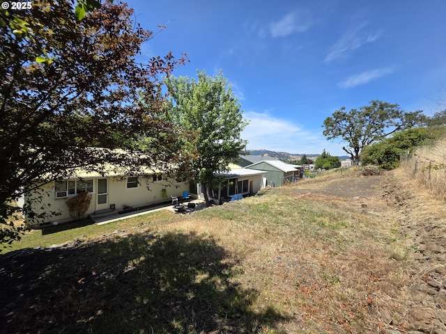 4545 Ridenour St, Roseburg, OR 97470 - view of yard with a sunroom and a patio area