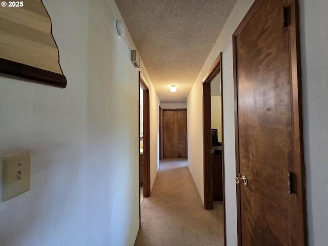 4545 Ridenour St, Roseburg, OR 97470 - corridor featuring light carpet and a textured ceiling