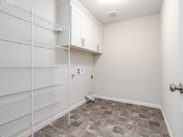 6820 N 89th Loop, Camas, WA 98607 - washroom with hookup for an electric dryer, cabinet space, hookup for a washing machine, and stone finish flooring