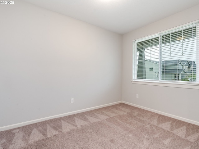 6820 N 89th Loop, Camas, WA 98607 - empty room featuring light carpet and baseboards