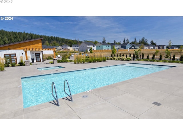 6820 N 89th Loop, Camas, WA 98607 - community pool featuring a residential view and a patio area