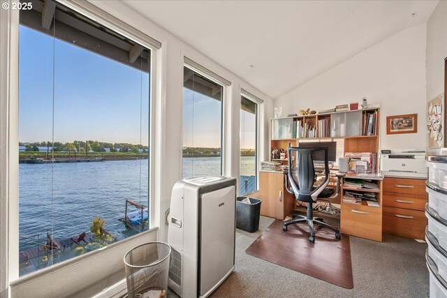 office featuring carpet flooring, a water view, and vaulted ceiling