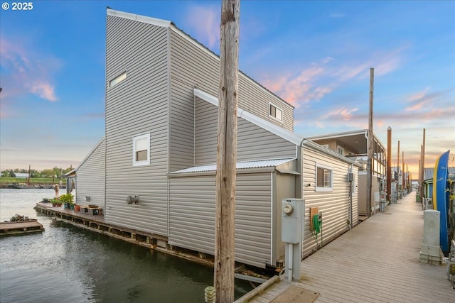 view of side of property featuring a water view