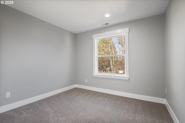 view of carpeted spare room