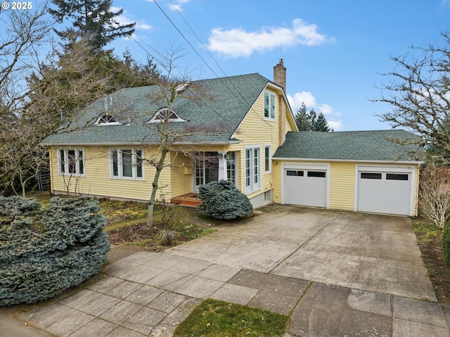 view of front of home with a garage