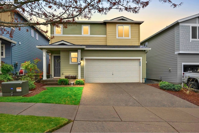 15574 Bachelor Ave, Sandy, OR 97055 - traditional-style house featuring an attached garage and driveway